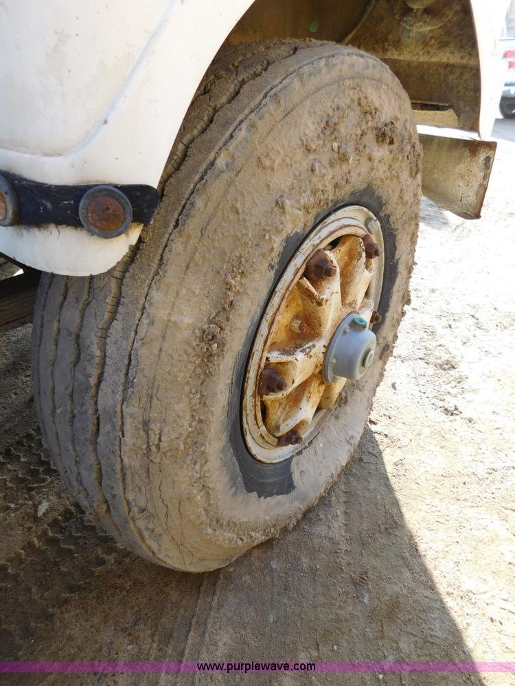 image for item J7406 1975 White Western Star ready mix truck