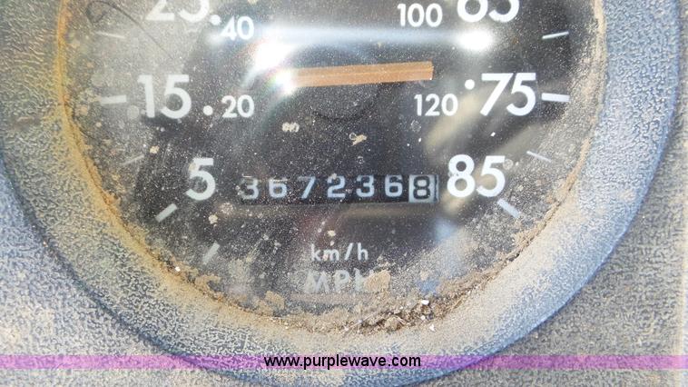 image for item J8381 1998 Freightliner FL112 dump flatbed truck