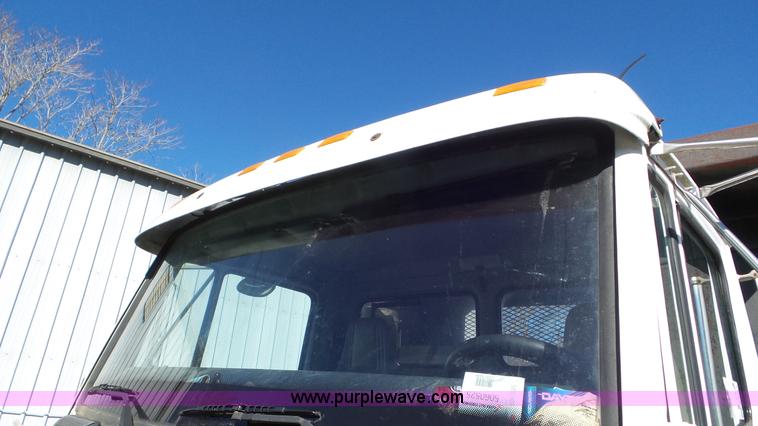 image for item J8381 1998 Freightliner FL112 dump flatbed truck