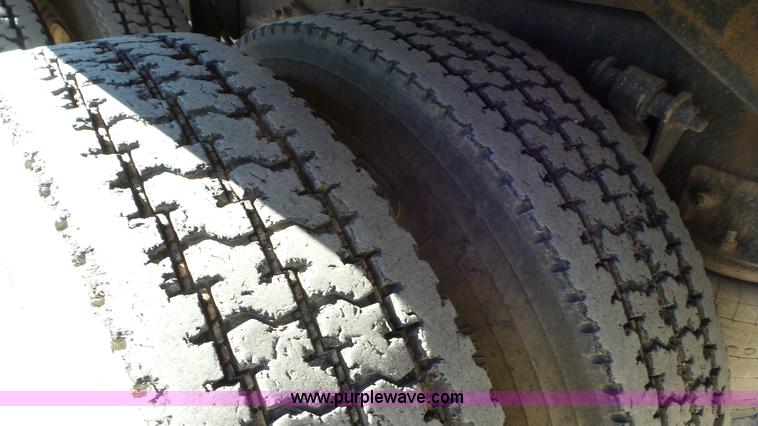 image for item J8381 1998 Freightliner FL112 dump flatbed truck