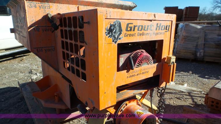 image for item J8385 Concrete grout hog
