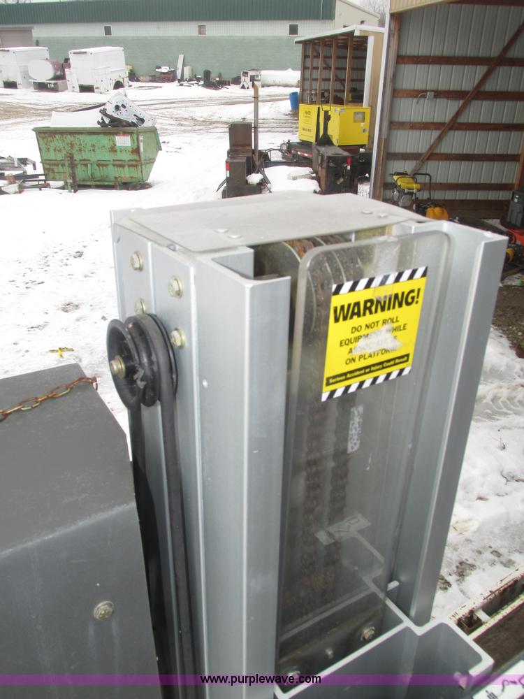 image for item J8786 2003 JLG 12SPHDDC vertical lift