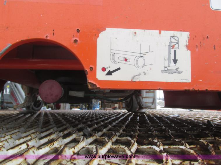 image for item J8786 2003 JLG 12SPHDDC vertical lift