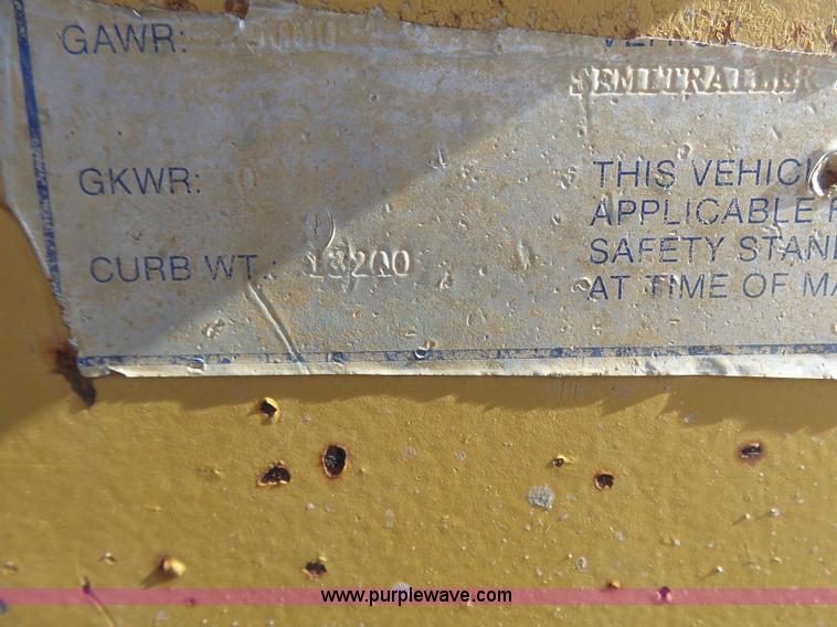 image for item L1510 1997 Dynaweld drop deck trailer