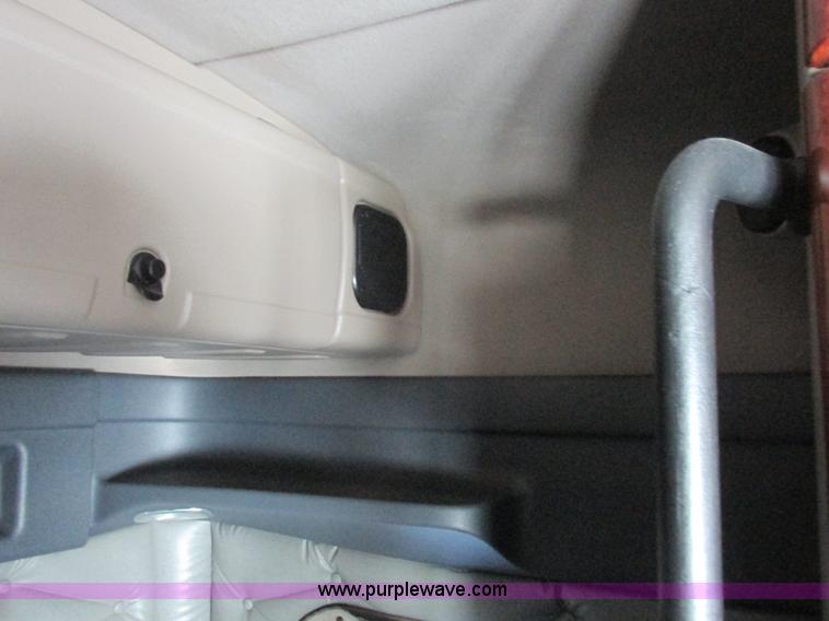 image for item L7001 2010 Freightliner Cascadia semi truck