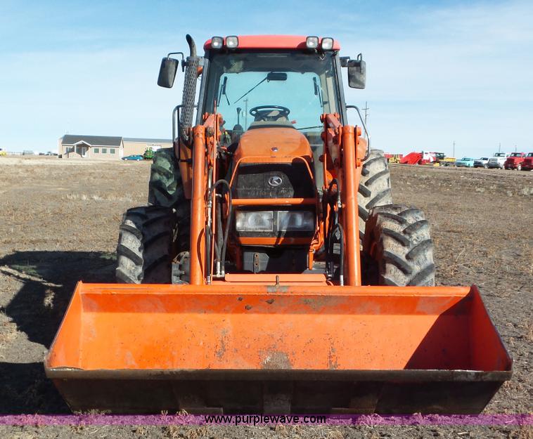 image for item G7104 Kubota M125X MFWD tractor