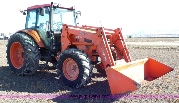 image for item G7104 Kubota M125X MFWD tractor