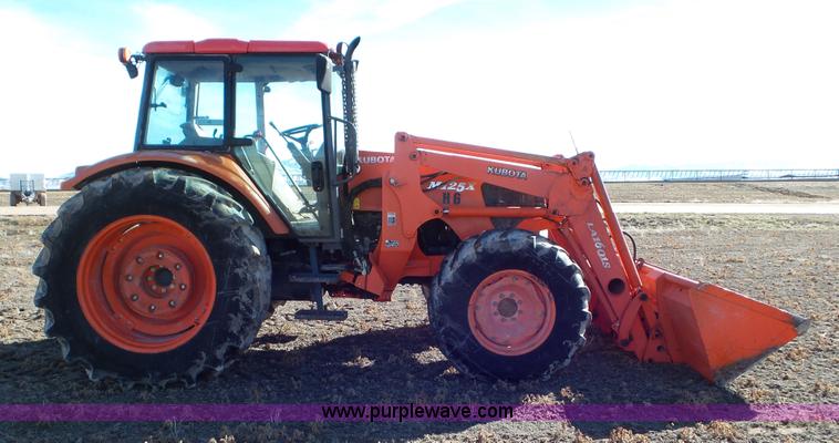 image for item G7104 Kubota M125X MFWD tractor