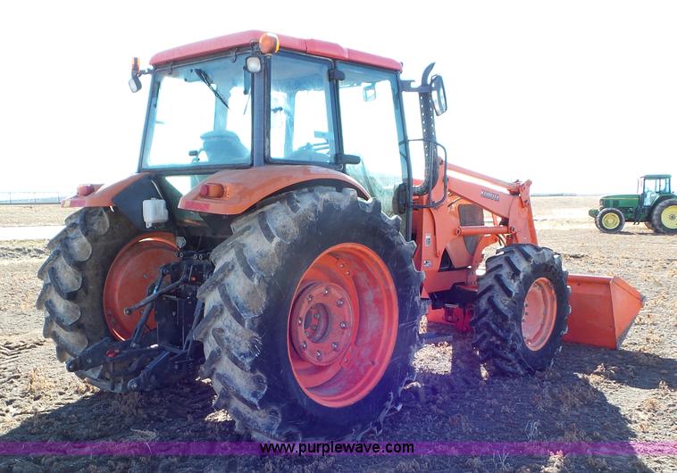 image for item G7104 Kubota M125X MFWD tractor