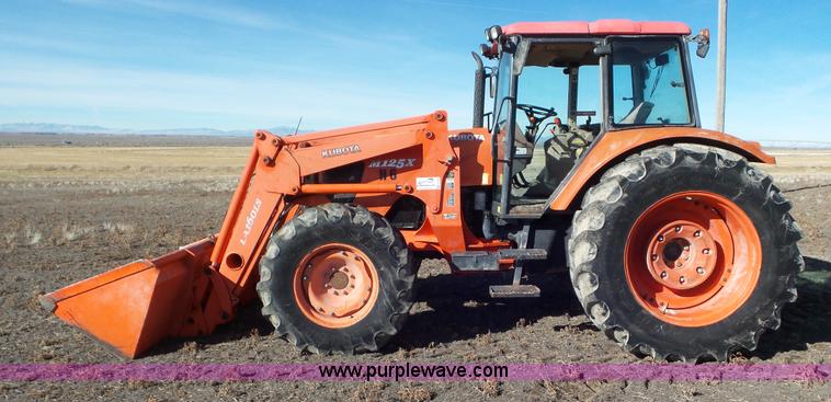 image for item G7104 Kubota M125X MFWD tractor