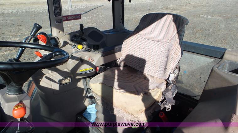 image for item G7104 Kubota M125X MFWD tractor