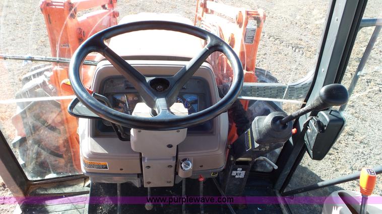 image for item G7104 Kubota M125X MFWD tractor