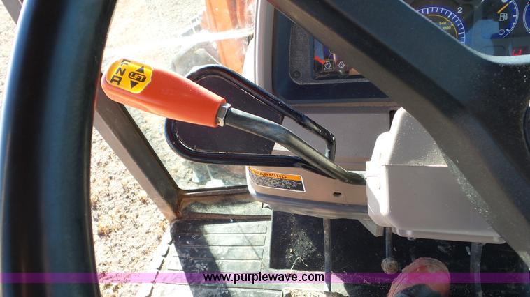 image for item G7104 Kubota M125X MFWD tractor