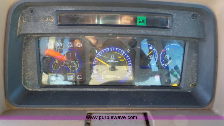 image for item G7104 Kubota M125X MFWD tractor