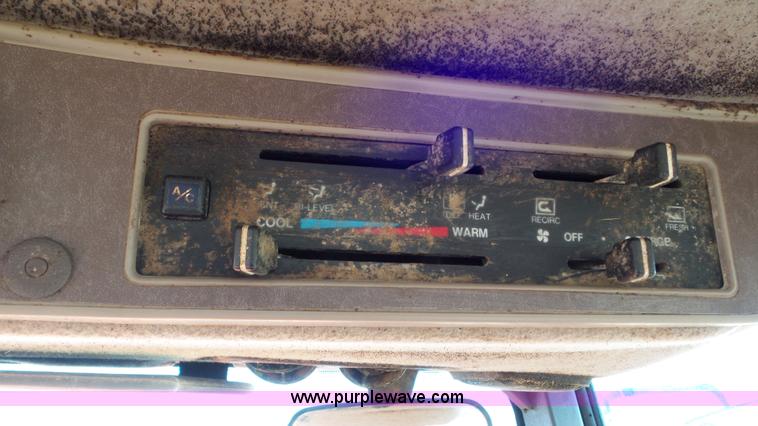 image for item G7104 Kubota M125X MFWD tractor