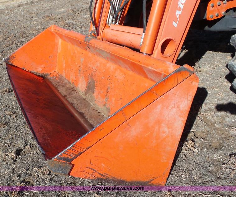 image for item G7104 Kubota M125X MFWD tractor