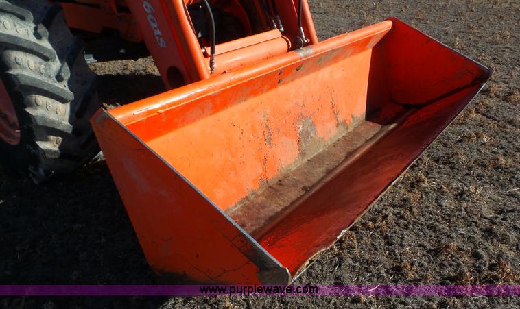 image for item G7104 Kubota M125X MFWD tractor