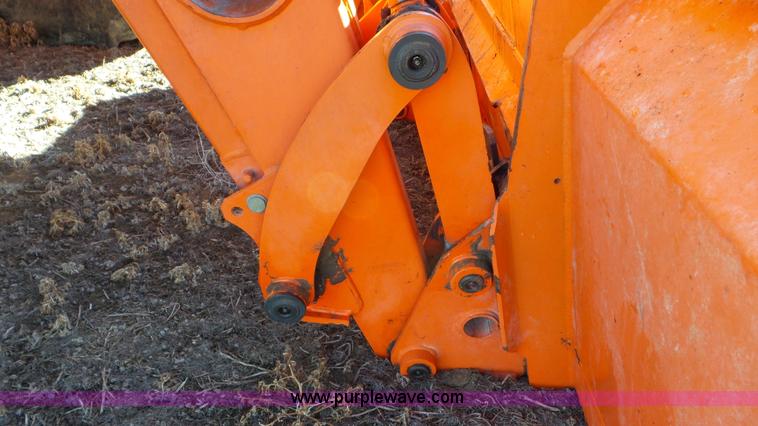 image for item G7104 Kubota M125X MFWD tractor