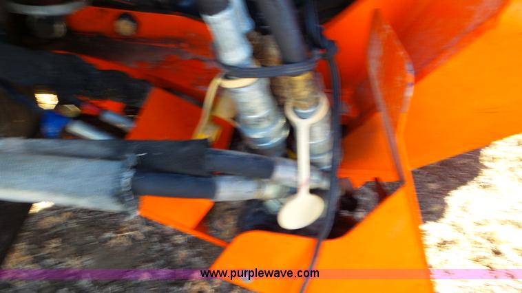 image for item G7104 Kubota M125X MFWD tractor