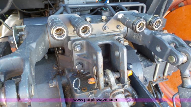 image for item G7104 Kubota M125X MFWD tractor