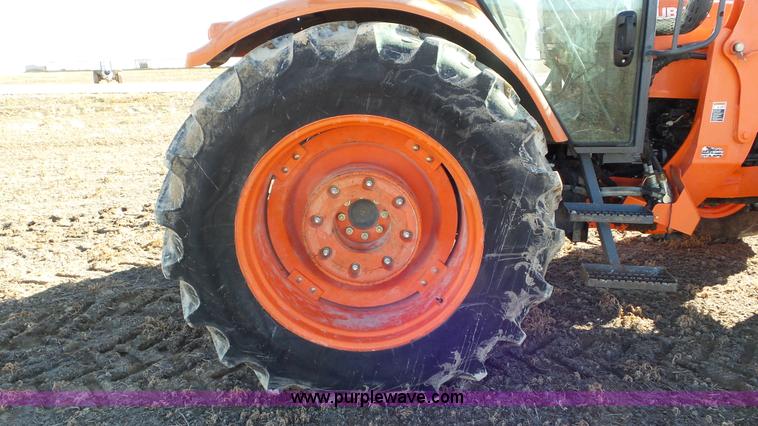 image for item G7104 Kubota M125X MFWD tractor