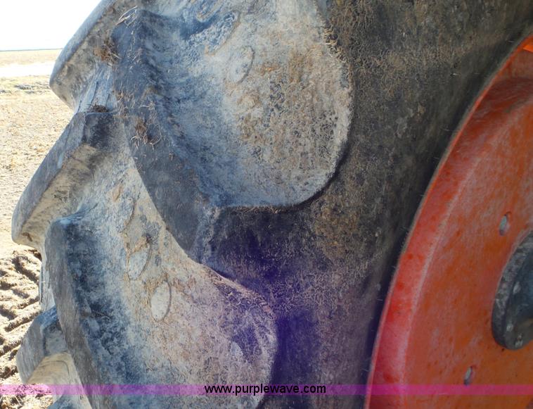 image for item G7104 Kubota M125X MFWD tractor