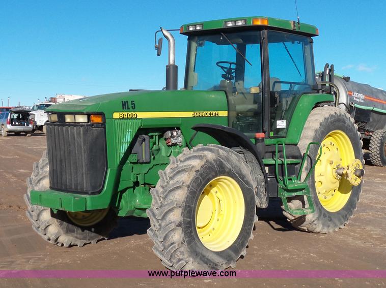 image for item G7123 1999 John Deere 8400 MFWD tractor