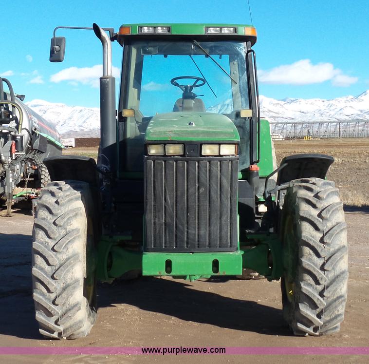 image for item G7123 1999 John Deere 8400 MFWD tractor