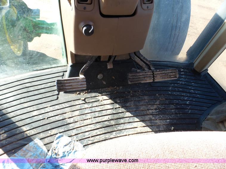 image for item G7123 1999 John Deere 8400 MFWD tractor