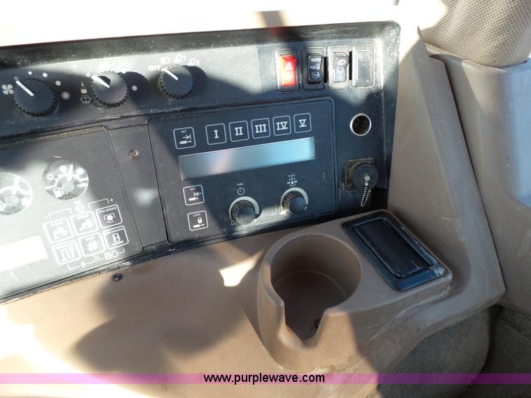 image for item G7123 1999 John Deere 8400 MFWD tractor