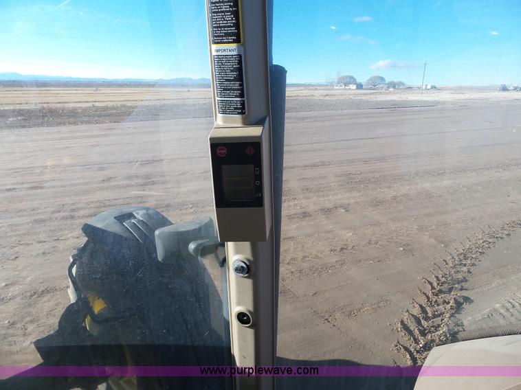 image for item G7123 1999 John Deere 8400 MFWD tractor