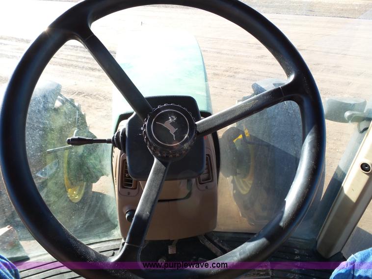 image for item G7123 1999 John Deere 8400 MFWD tractor