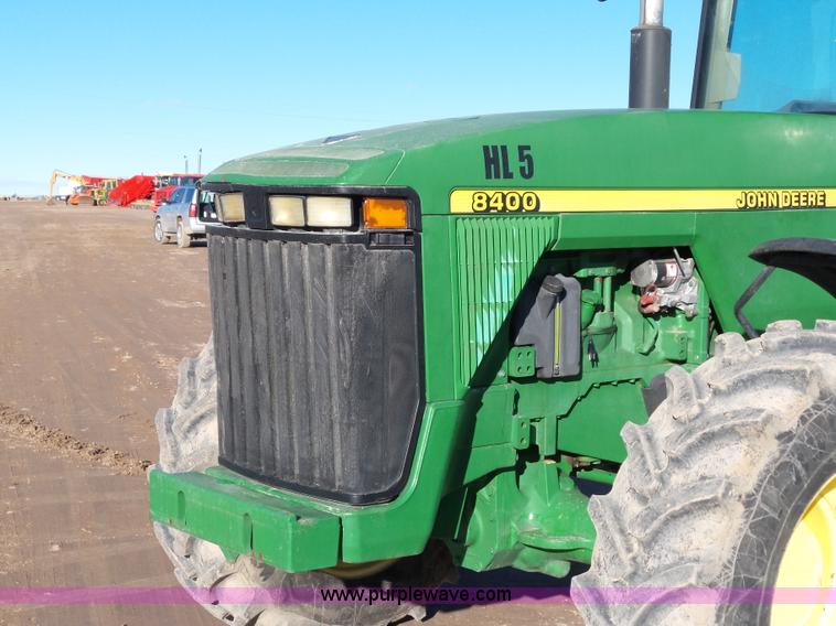 image for item G7123 1999 John Deere 8400 MFWD tractor