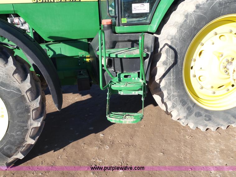 image for item G7123 1999 John Deere 8400 MFWD tractor