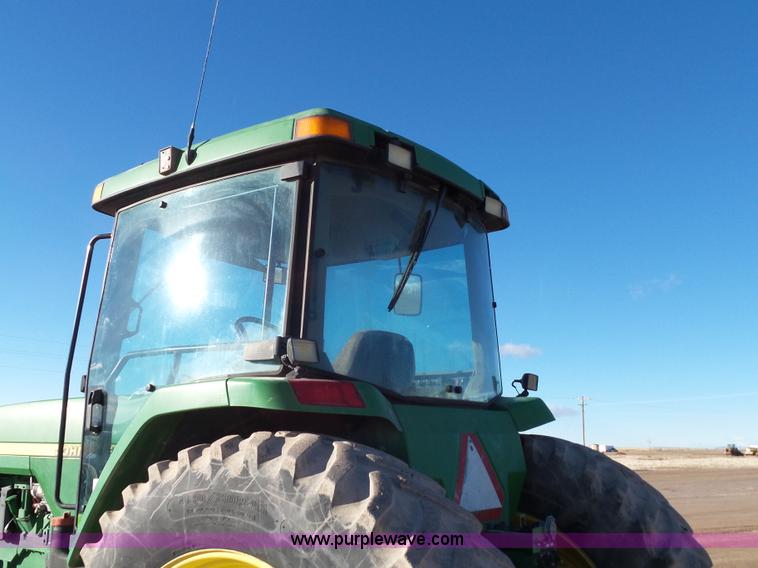 image for item G7123 1999 John Deere 8400 MFWD tractor
