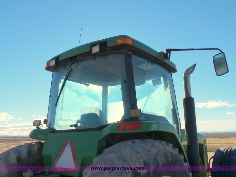 image for item G7123 1999 John Deere 8400 MFWD tractor