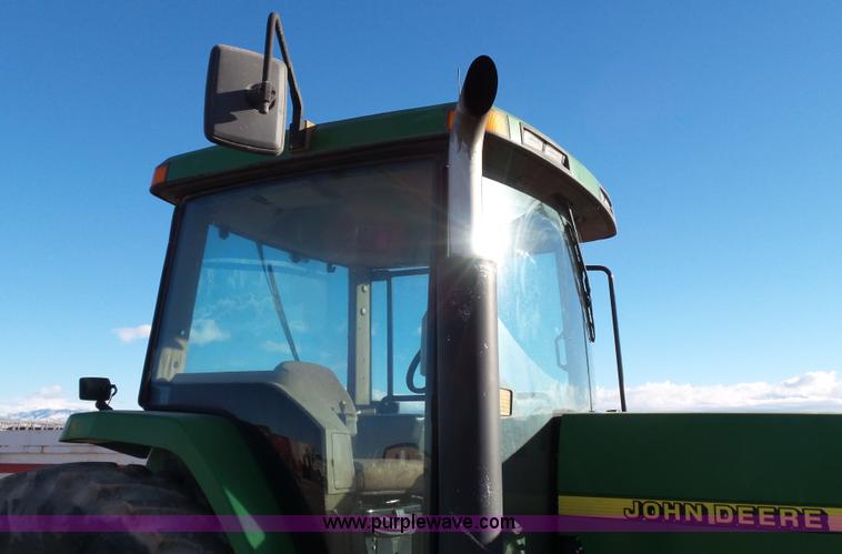 image for item G7123 1999 John Deere 8400 MFWD tractor