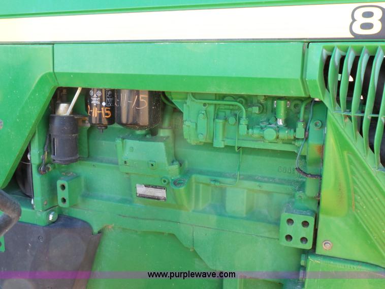 image for item G7123 1999 John Deere 8400 MFWD tractor