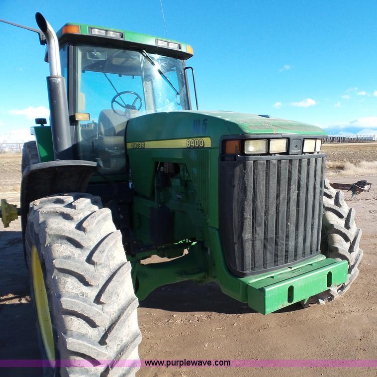image for item G7123 1999 John Deere 8400 MFWD tractor