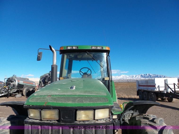 image for item G7123 1999 John Deere 8400 MFWD tractor