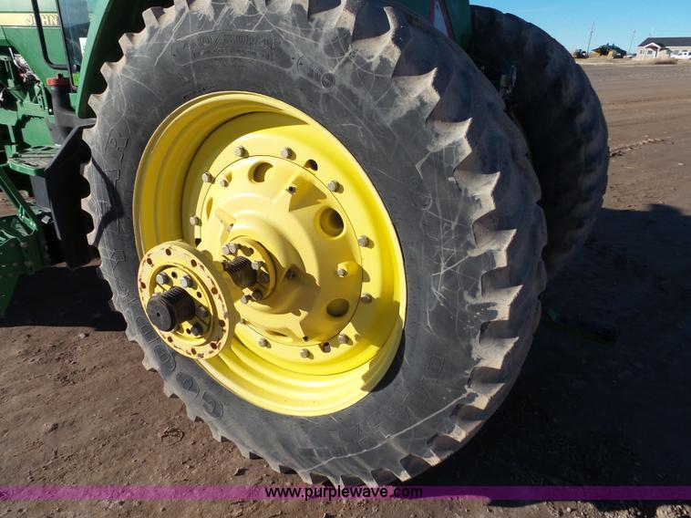 image for item G7123 1999 John Deere 8400 MFWD tractor