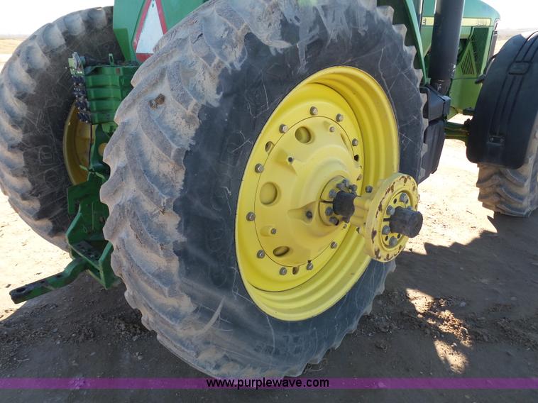 image for item G7123 1999 John Deere 8400 MFWD tractor