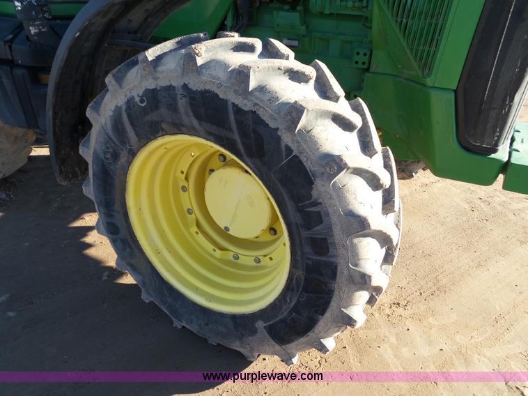 image for item G7123 1999 John Deere 8400 MFWD tractor