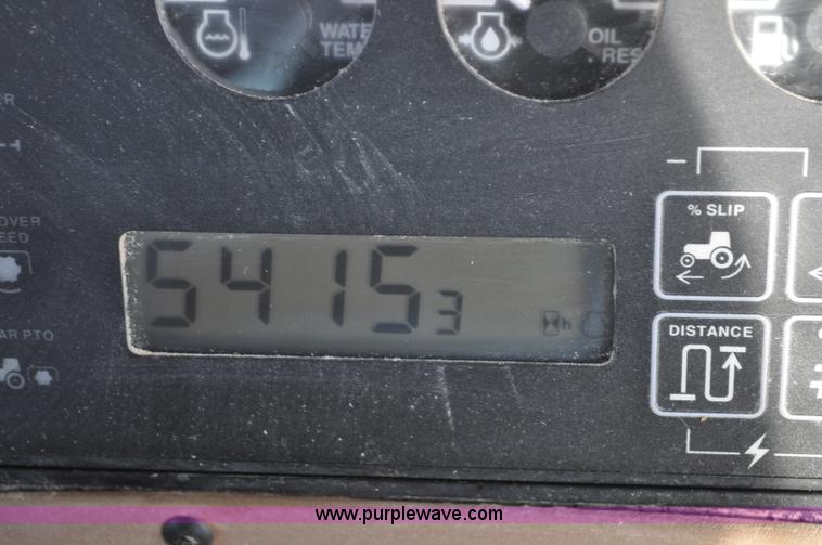 image for item G7123 1999 John Deere 8400 MFWD tractor