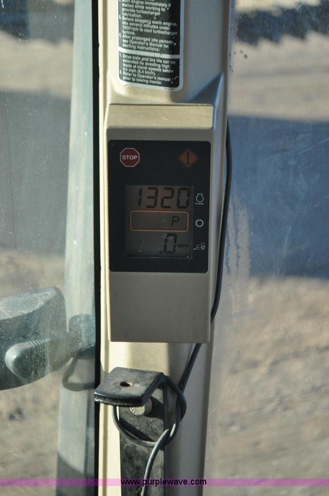 image for item G7129 1997 John Deere 8400 MFWD tractor