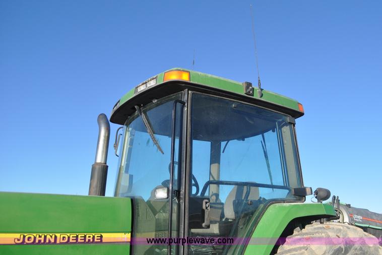 image for item G7129 1997 John Deere 8400 MFWD tractor