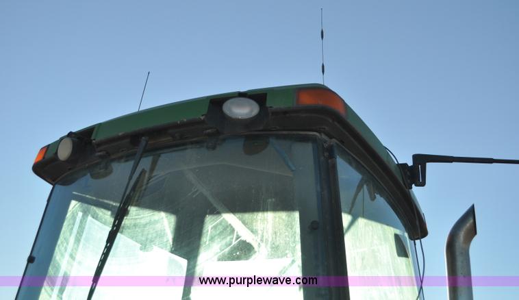 image for item G7129 1997 John Deere 8400 MFWD tractor
