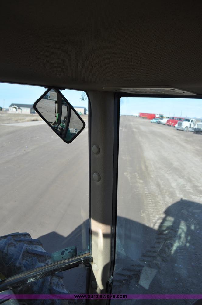 image for item G7130 1999 John Deere 7810 MFWD tractor