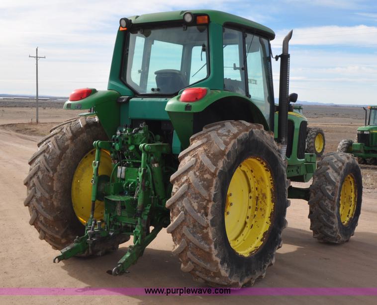 image for item G7138 2003 John Deere 7520 MFWD tractor