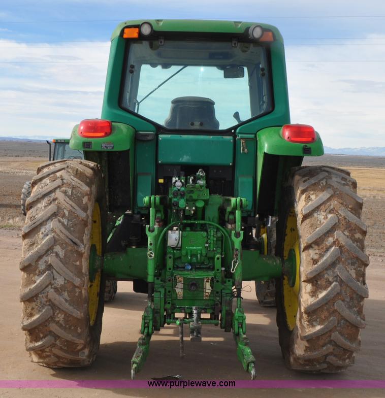 image for item G7138 2003 John Deere 7520 MFWD tractor